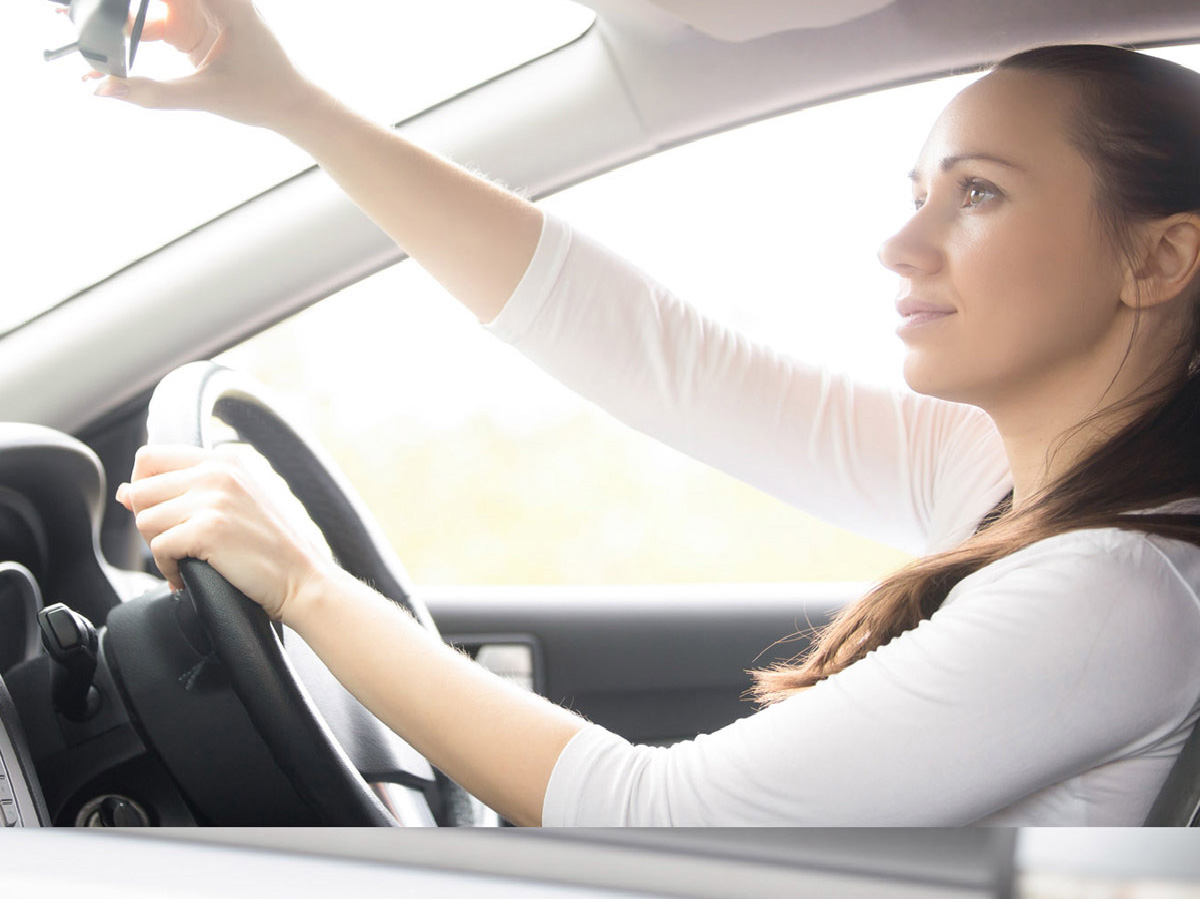 happy male driving car